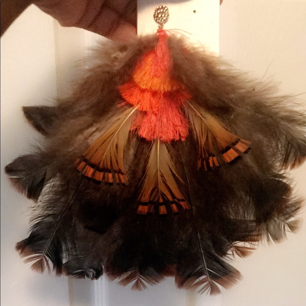 Feather earrings comes in a pair